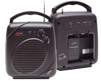 Two black portable PA speakers, one facing front and one showing the back and battery compartment.